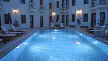 Outdoor pool, pool umbrellas, pool loungers
