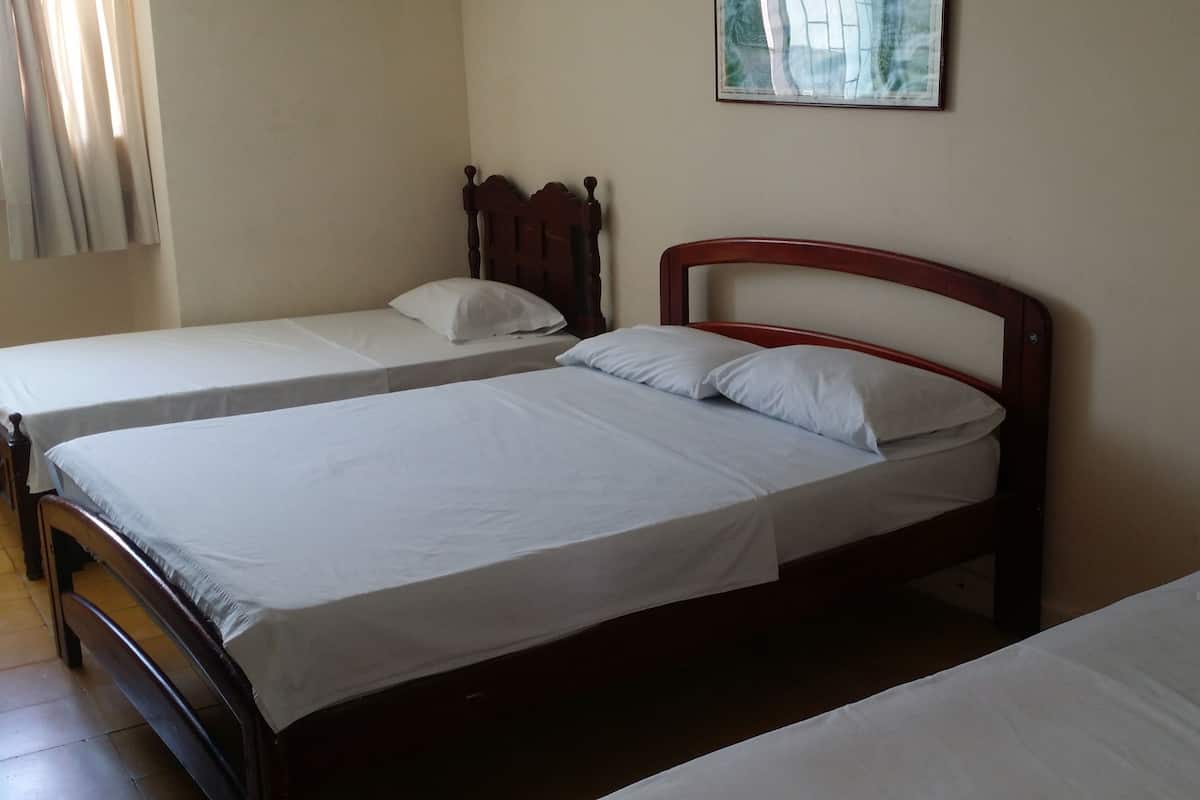 Triple Room | Desk, iron/ironing board, cribs (free)