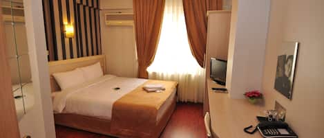 Ropa de cama de alta calidad y minibar