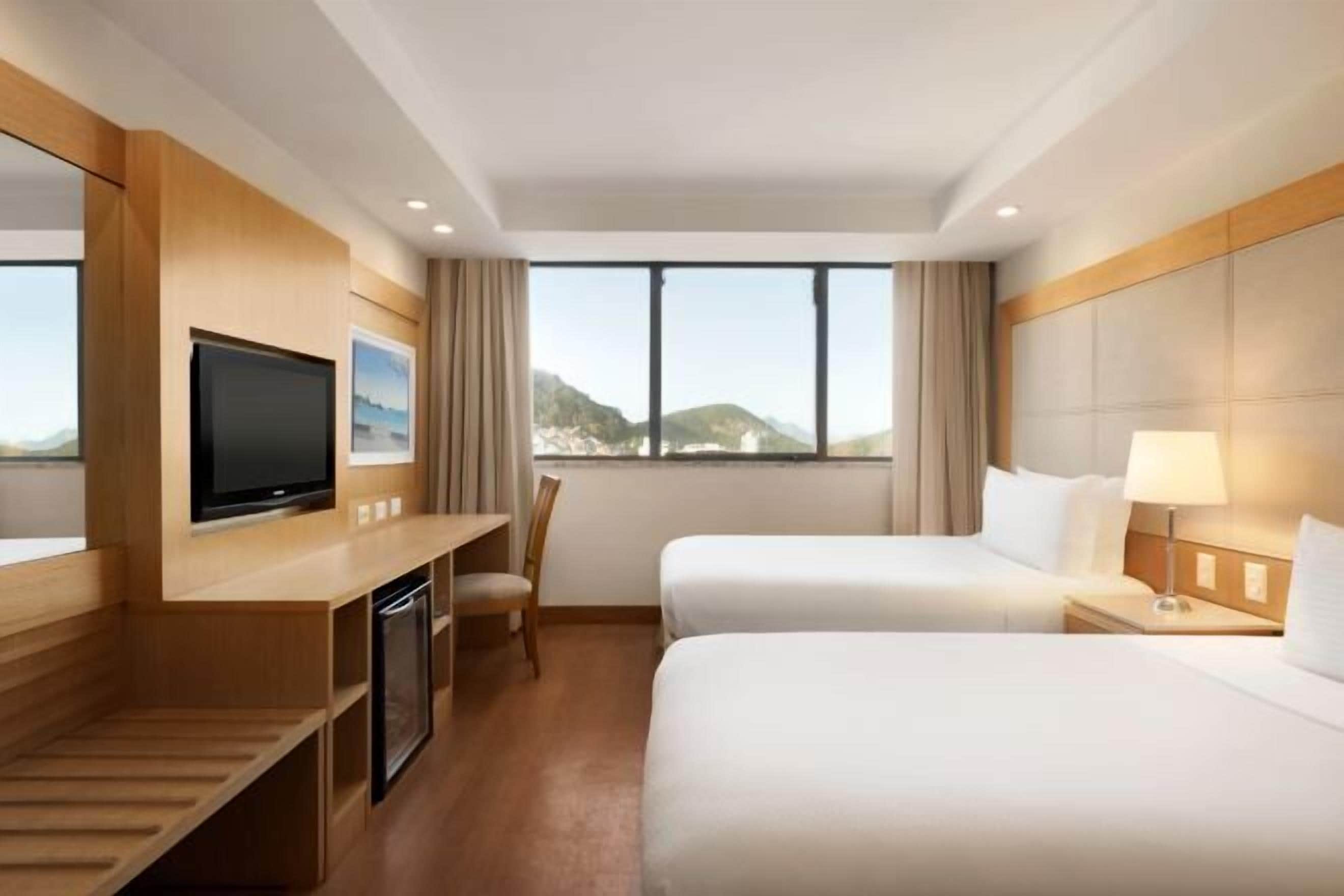 Hypo-allergenic bedding, minibar, in-room safe, individually decorated