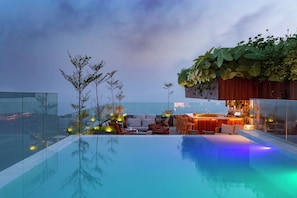 2 outdoor pools, open 8:00 AM to 8:00 PM, pool umbrellas, sun loungers
