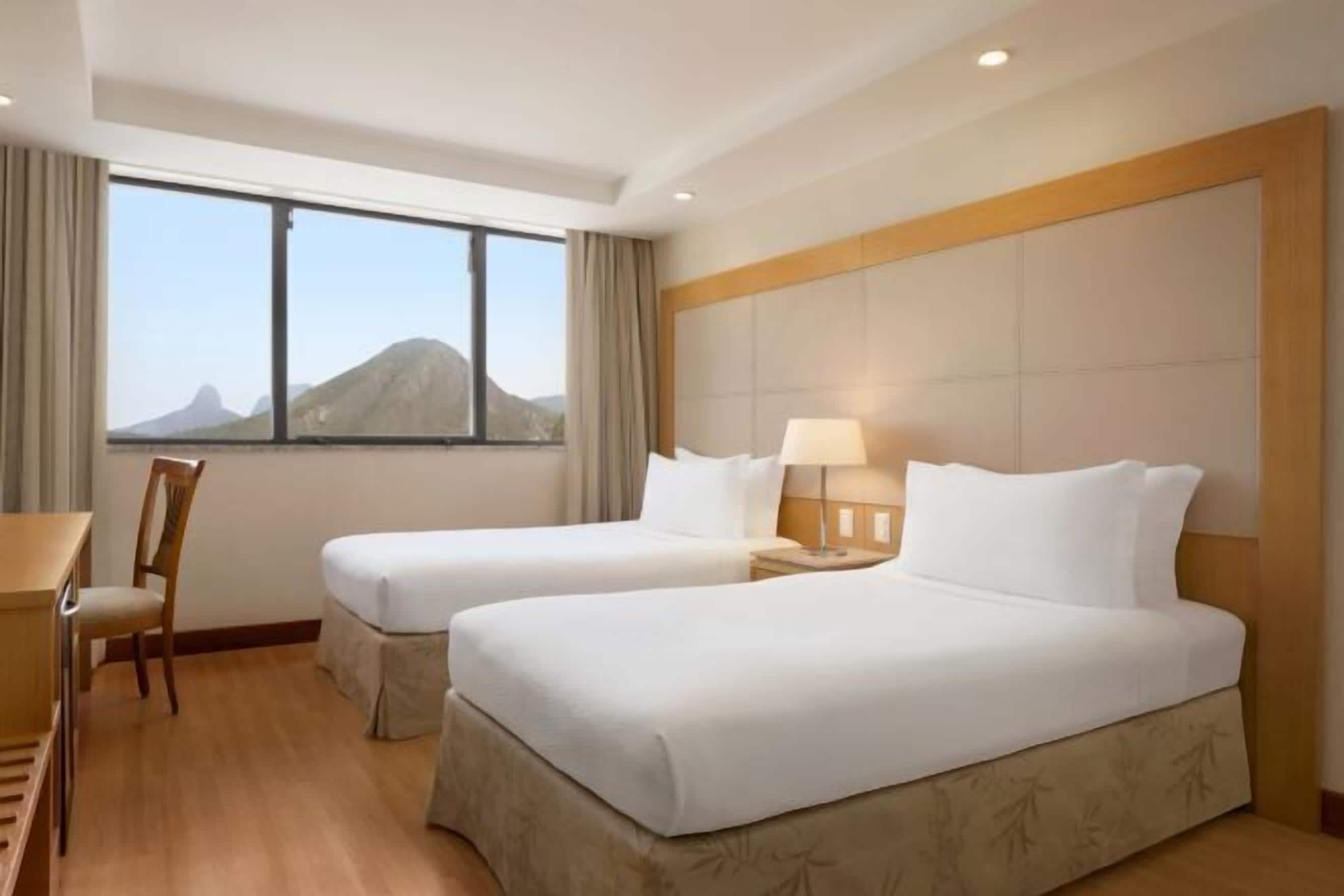 Hypo-allergenic bedding, minibar, in-room safe, individually decorated