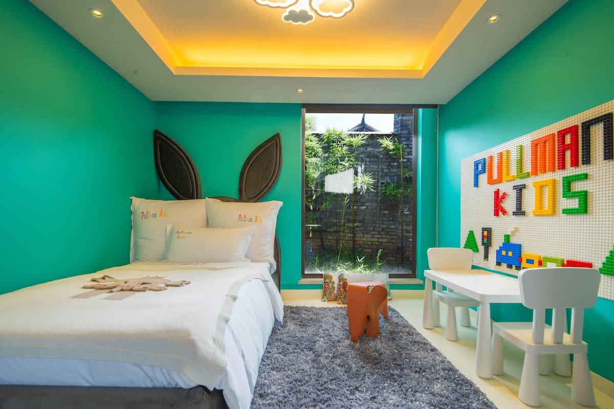 Deluxe-Villa, Gartenblick (1 King Bed and 1 Kid's Bed) | 1 Schlafzimmer, hochwertige Bettwaren, Daunenbettdecken, Minibar