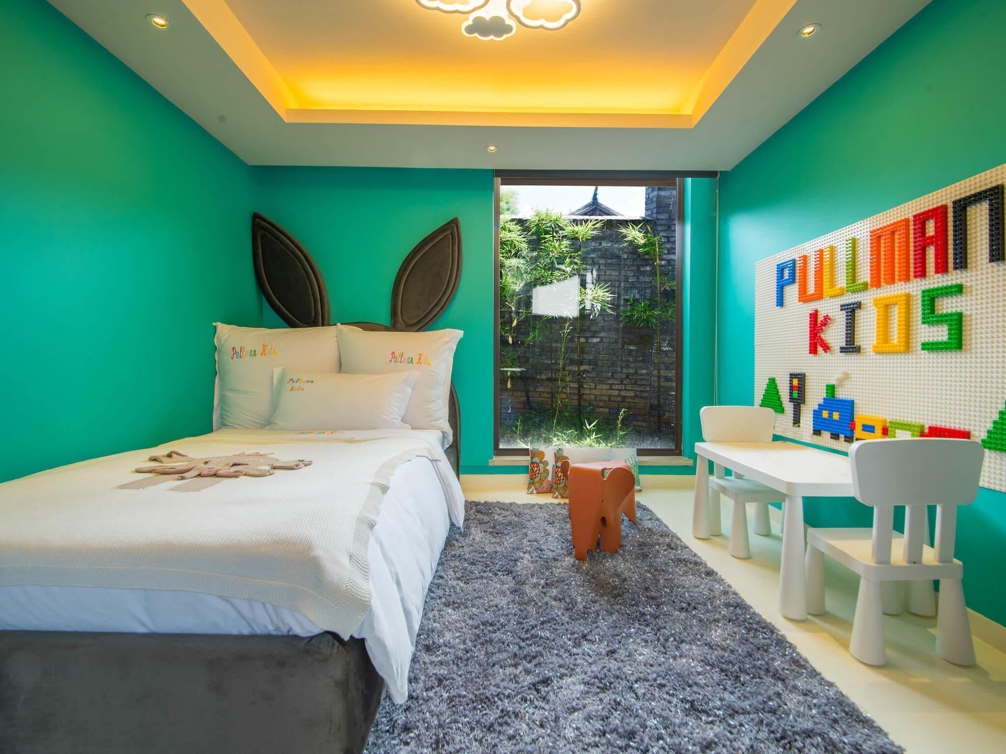 Villa – deluxe, hageutsikt (1 King Bed and 1 Kid's Bed) | 1 soverom, sengetøy av topp kvalitet, dundyner og minibar