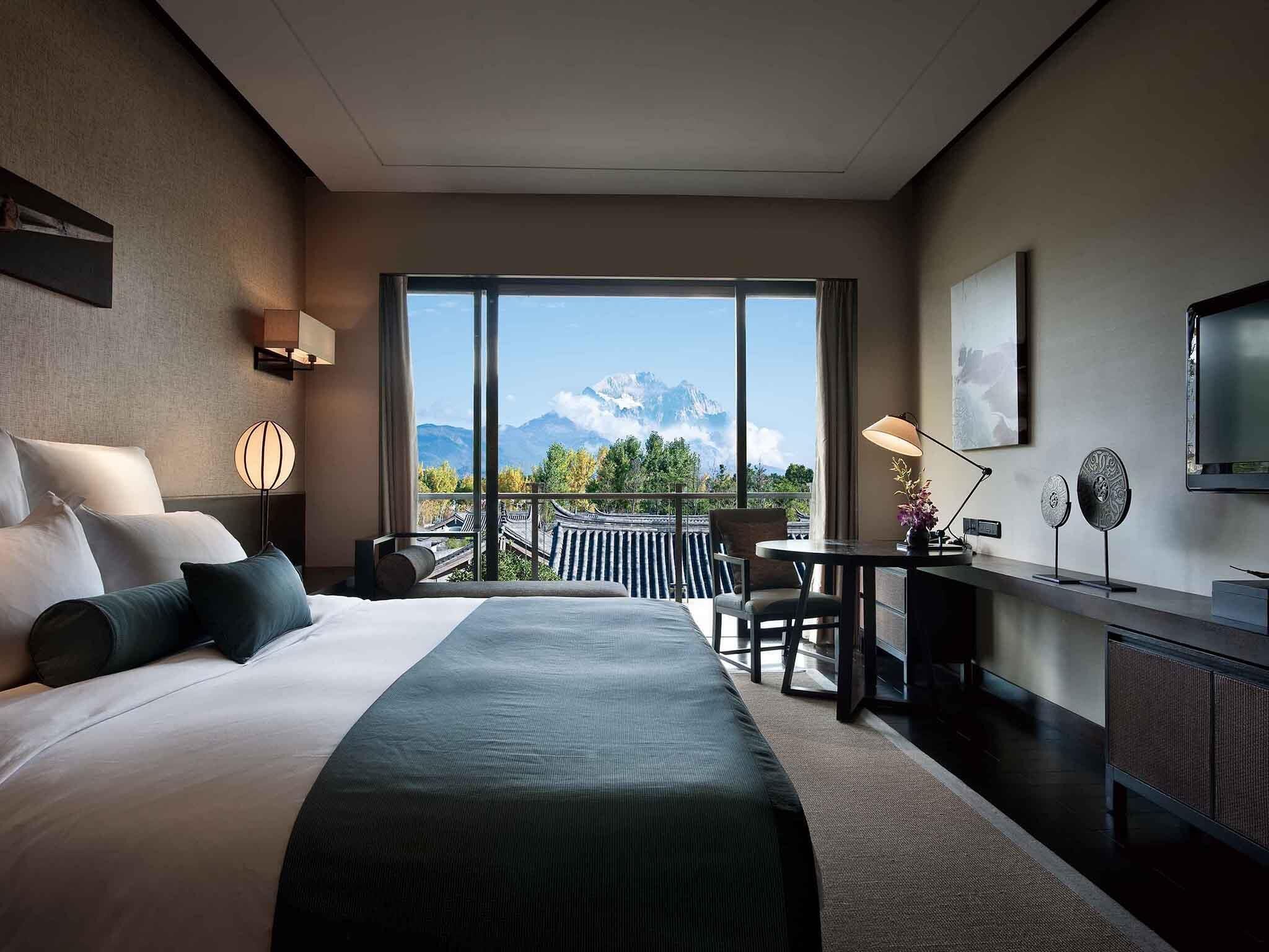 1 habitación, ropa de cama de alta calidad, cubrecamas y minibar 