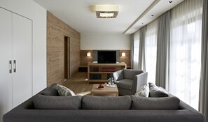 Deluxe Double Room | Living area | Flat-screen TV