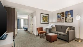 Junior Suite, 1 King Bed | Living area | 42-inch LCD TV with cable channels, TV