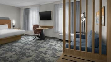 Ropa de cama de alta calidad, caja fuerte, escritorio y cortinas opacas