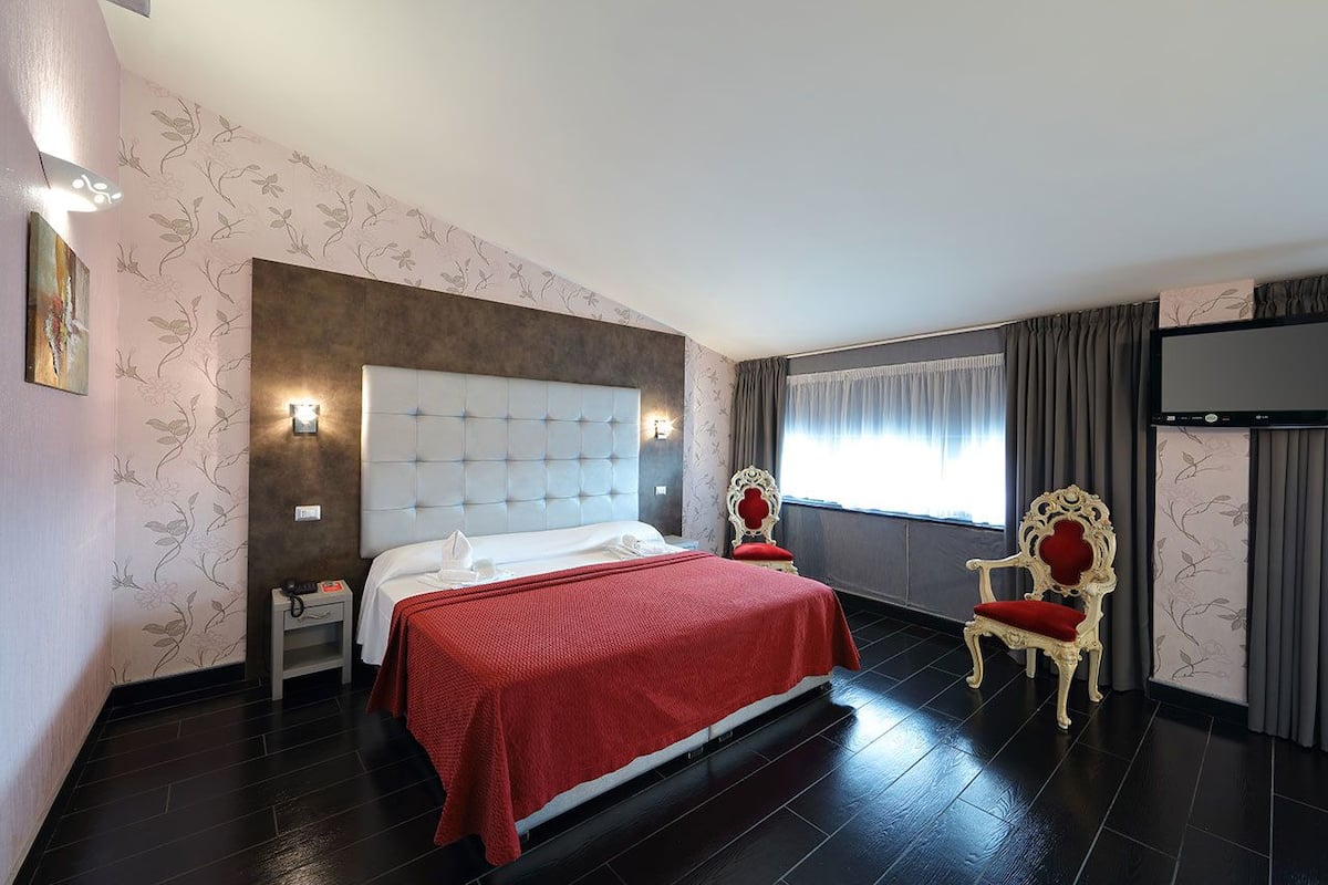 Family Quadruple Room | 1 bedroom, hypo-allergenic bedding, minibar, in-room safe