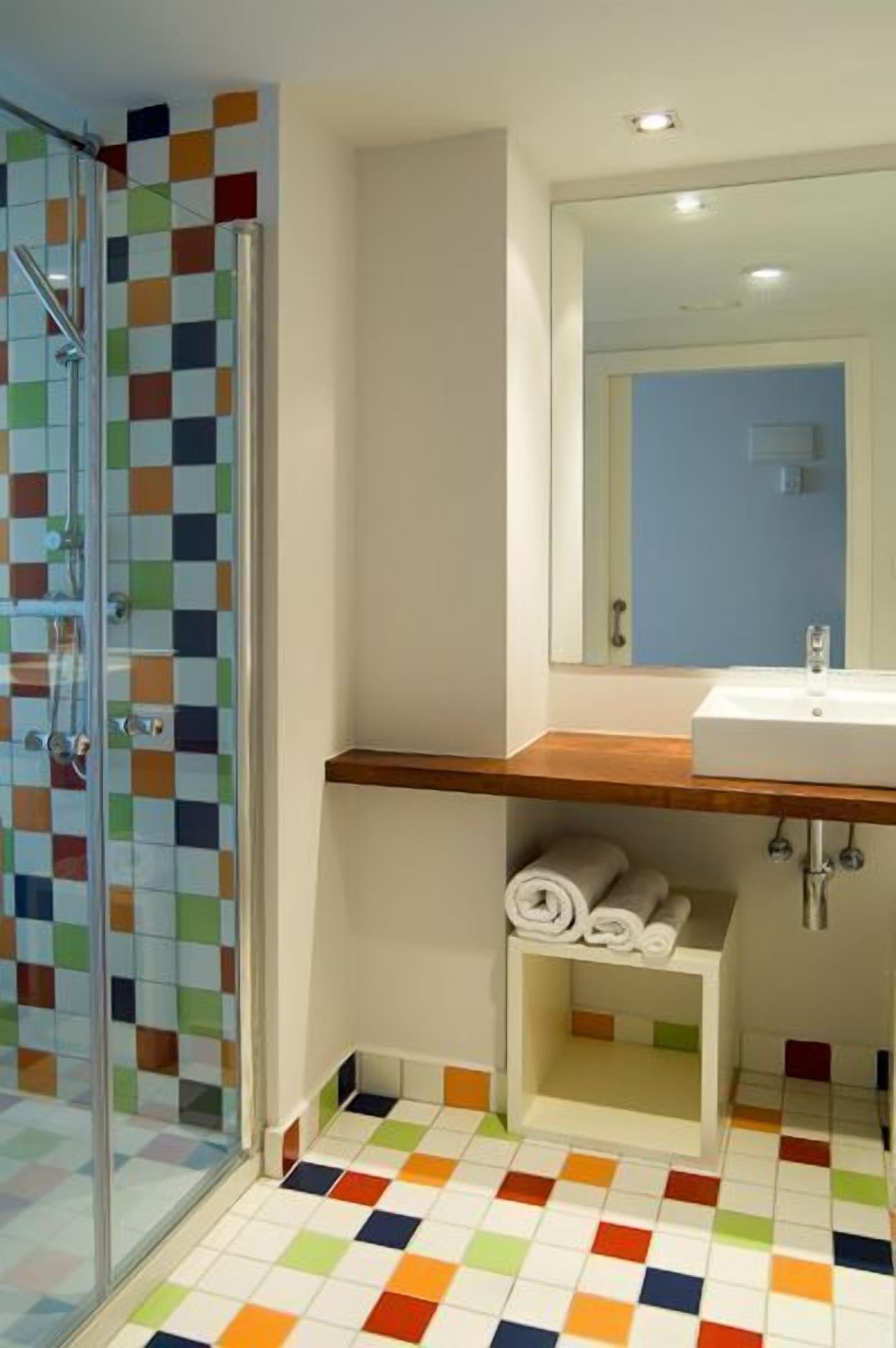 shower, hair dryer, slippers, bidet