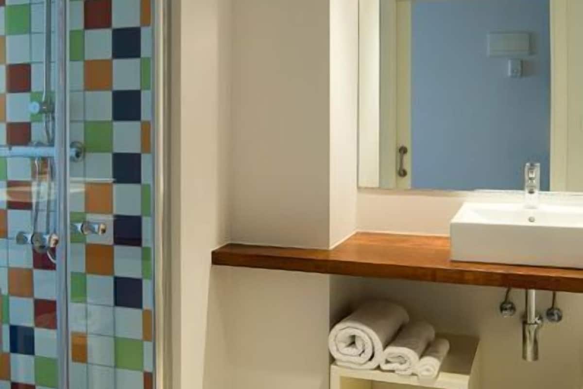 shower, hair dryer, slippers, bidet