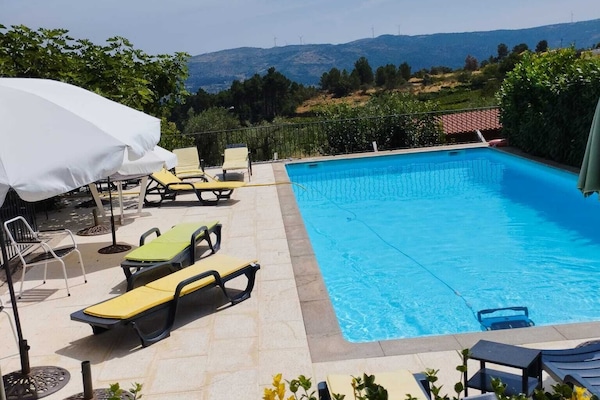 Outdoor pool, pool umbrellas, sun loungers