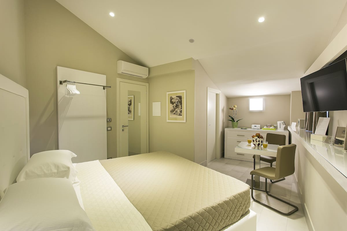 1 slaapkamer, Italiaanse Frette-lakens, luxe beddengoed, een minibar