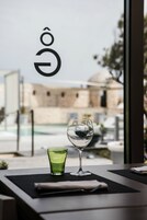 Breakfast, lunch, dinner served; Italian cuisine, pool views 