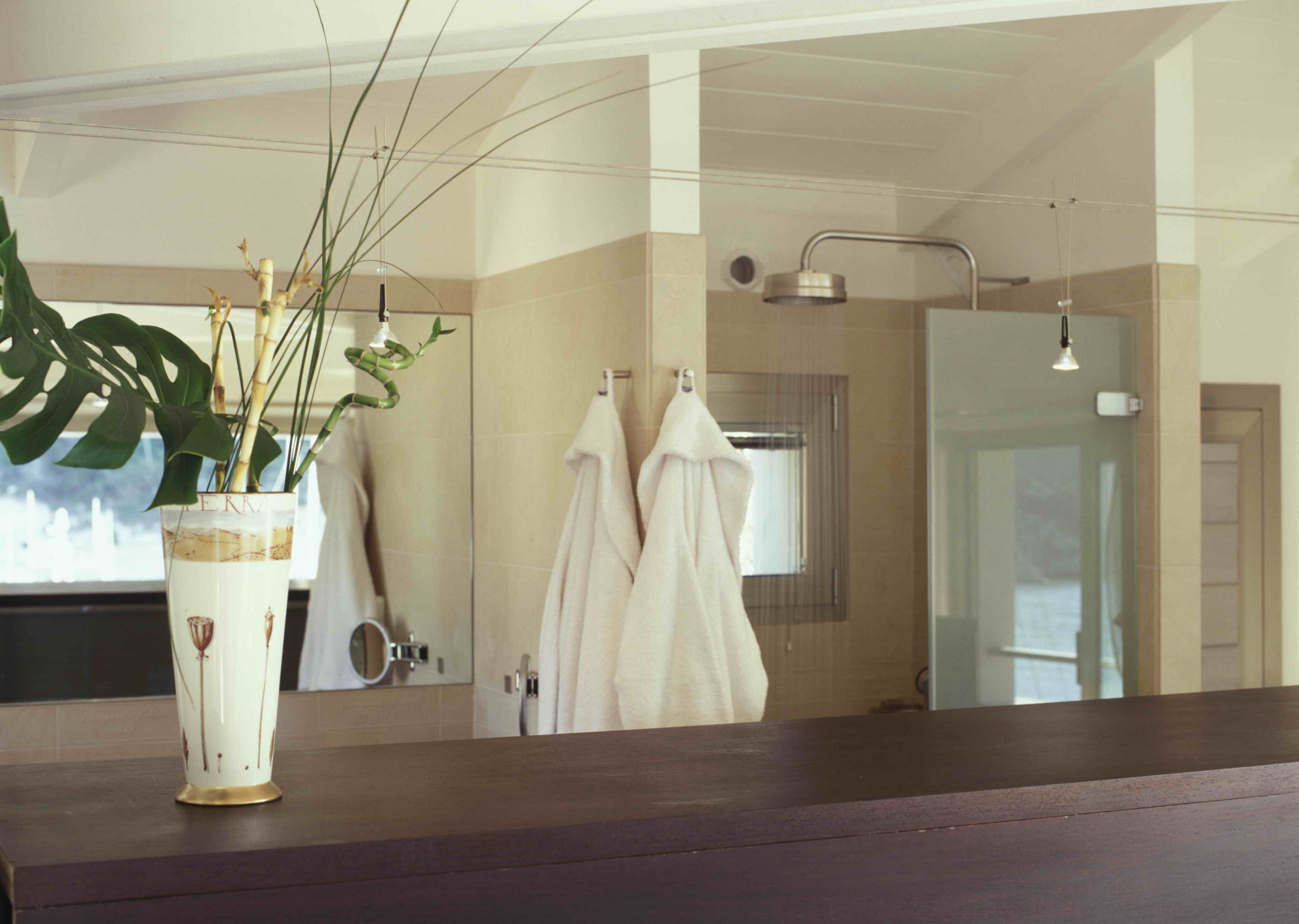 hair dryer, bathrobes, slippers, towels