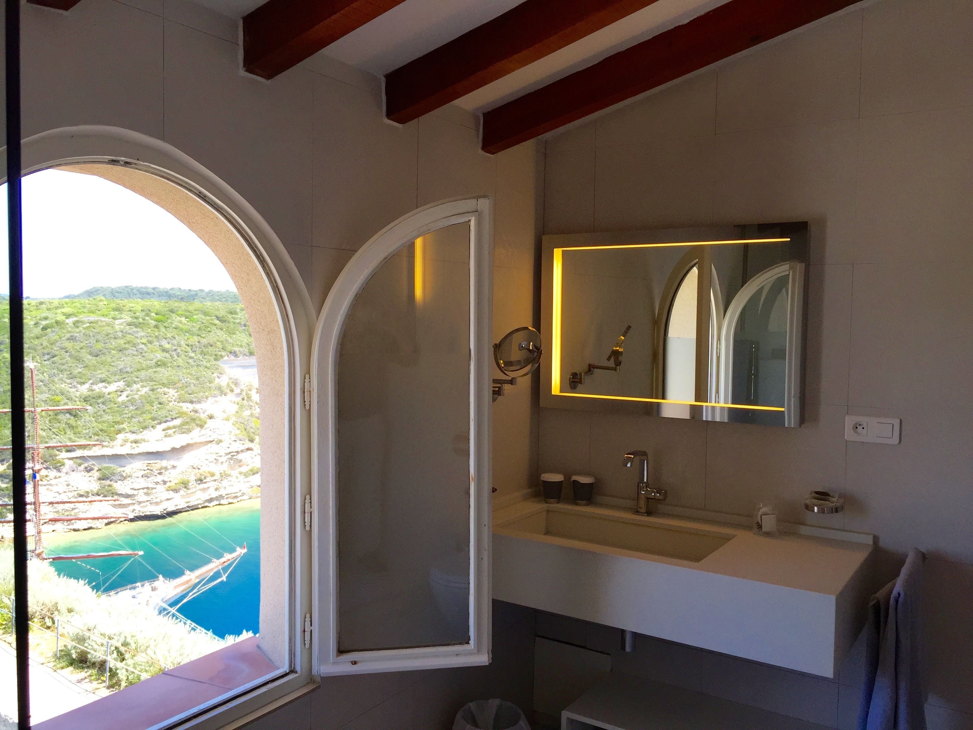 junior suite | bathroom | hair dryer, bathrobes, slippers, towels