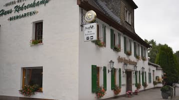 Experience the charm of Haus Kehrenkamp Biergarten, a traditional European-style hotel restaurant with a cozy atmosphere.