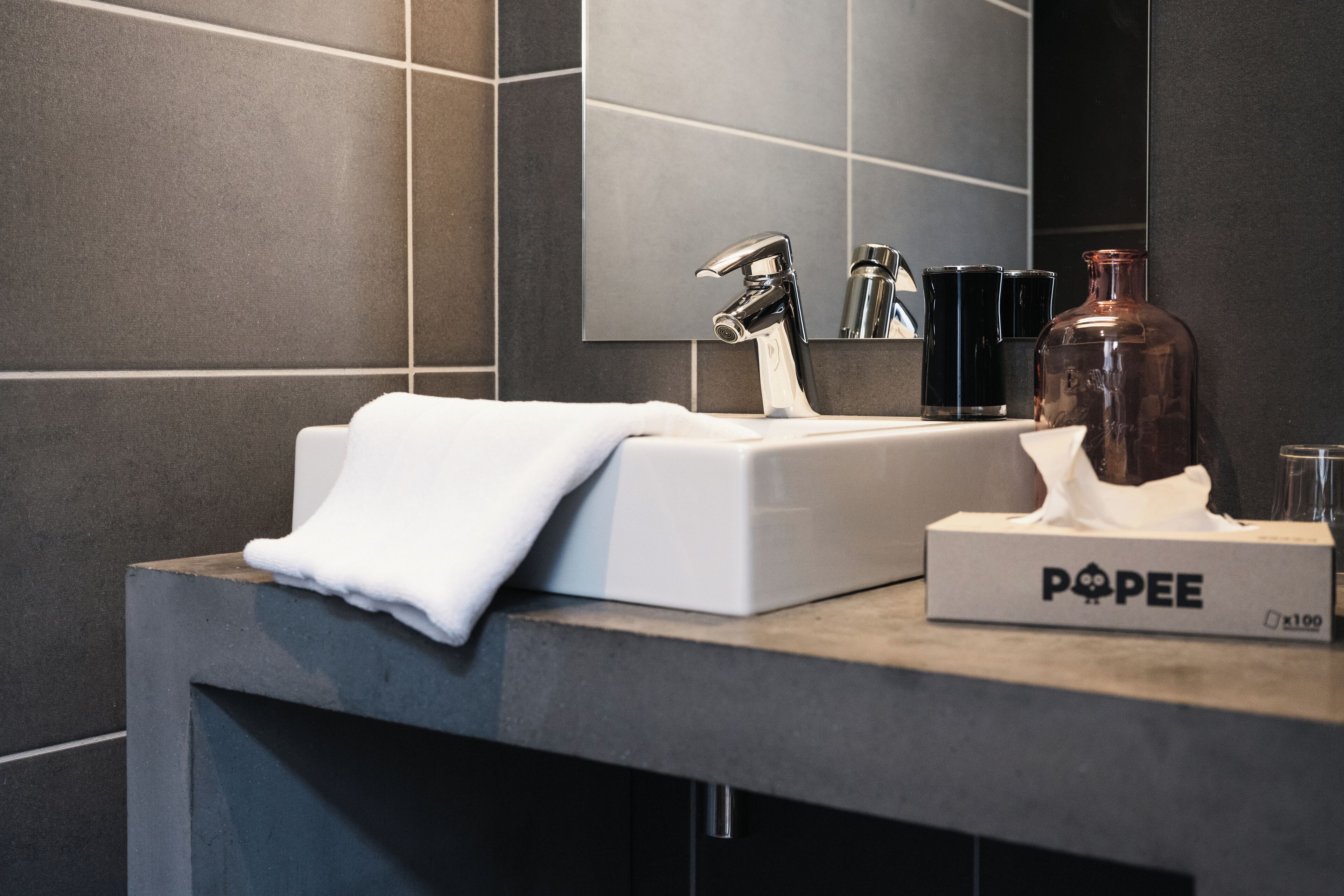 deluxe double room | bathroom | shower, hair dryer, towels