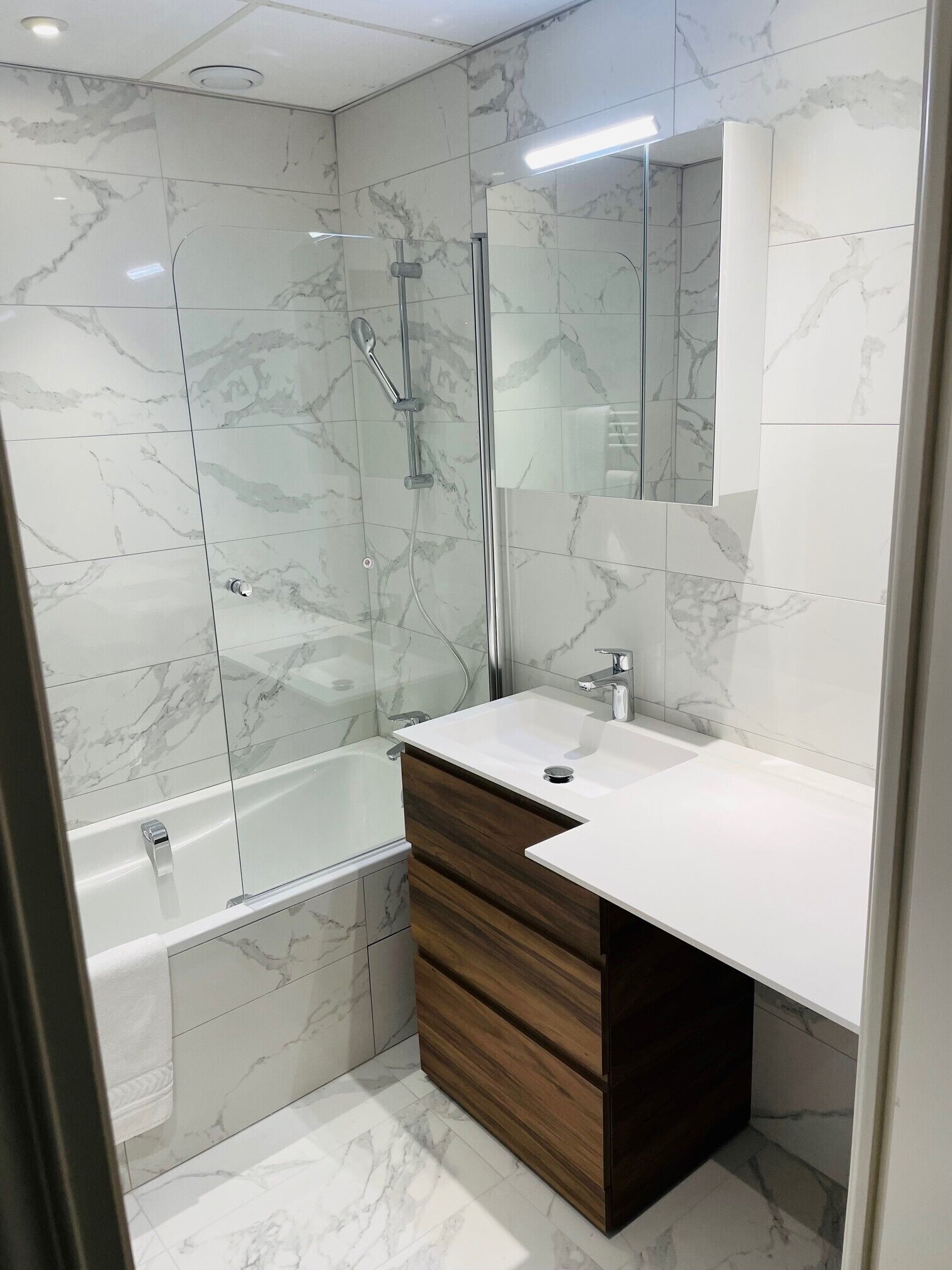 studio (for 4) | bathroom | rainfall showerhead, hair dryer, towels