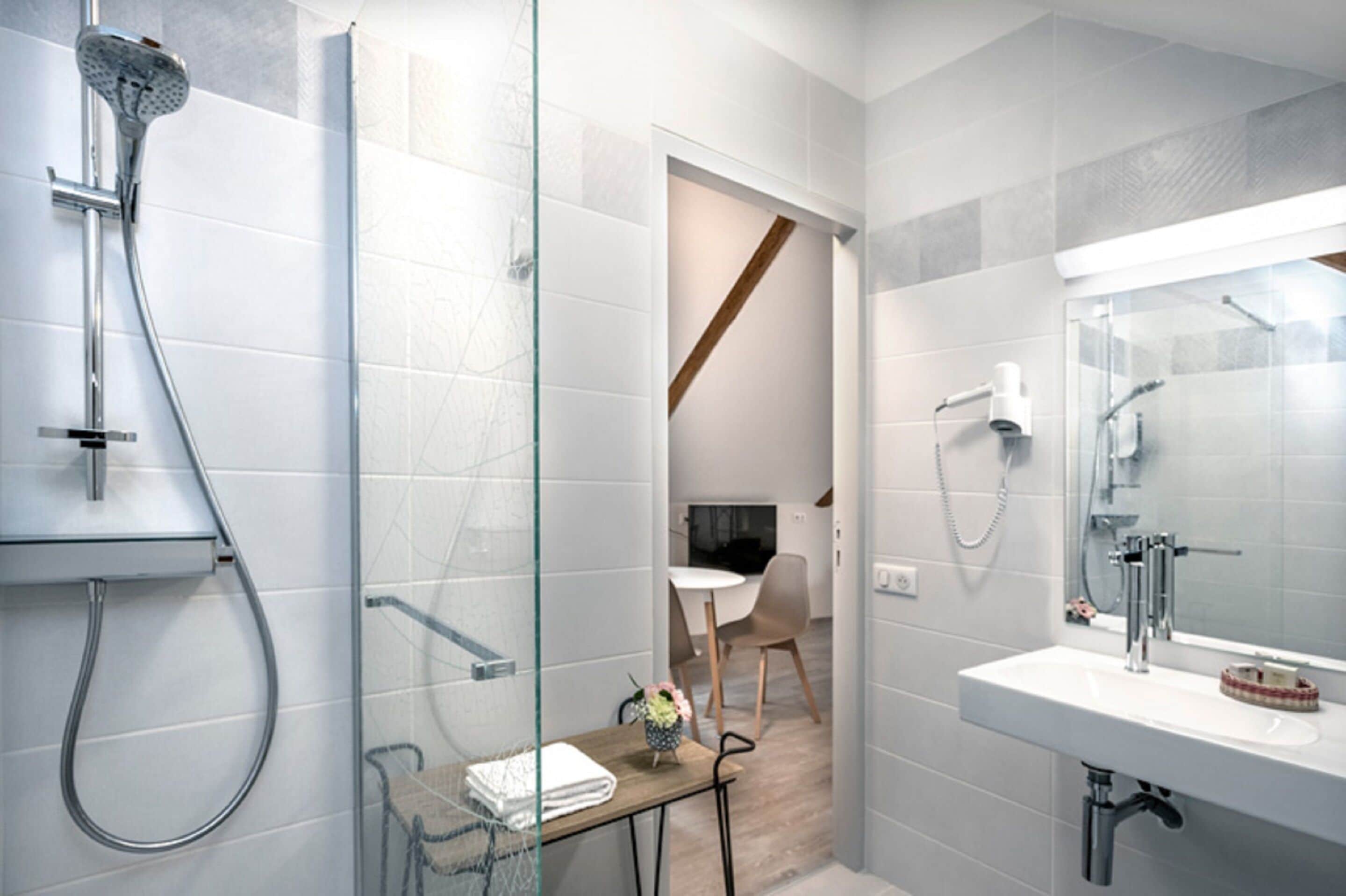 superior double room | bathroom | hair dryer, towels