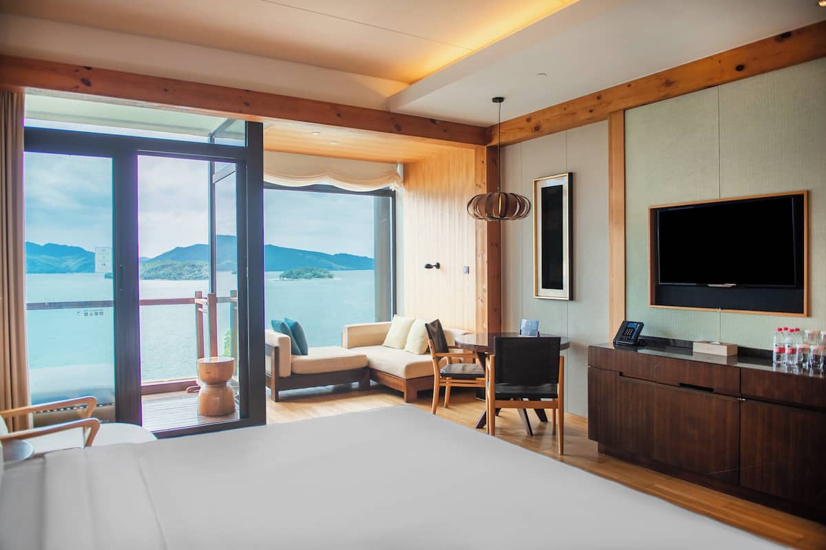 Premium Room, 1 King Bed, Lake View | 1 bedroom, minibar, in-room safe, desk