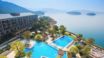 Indoor pool, seasonal outdoor pool, sun loungers, lifeguards on site