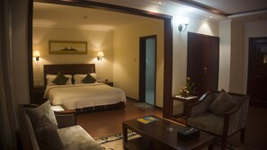 Suite exécutive | Literie de qualité supérieure, couette en duvet d'oie, minibar