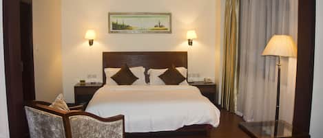 行政套房 | 高档床上用品、羽绒被、迷你吧、客房内保险箱