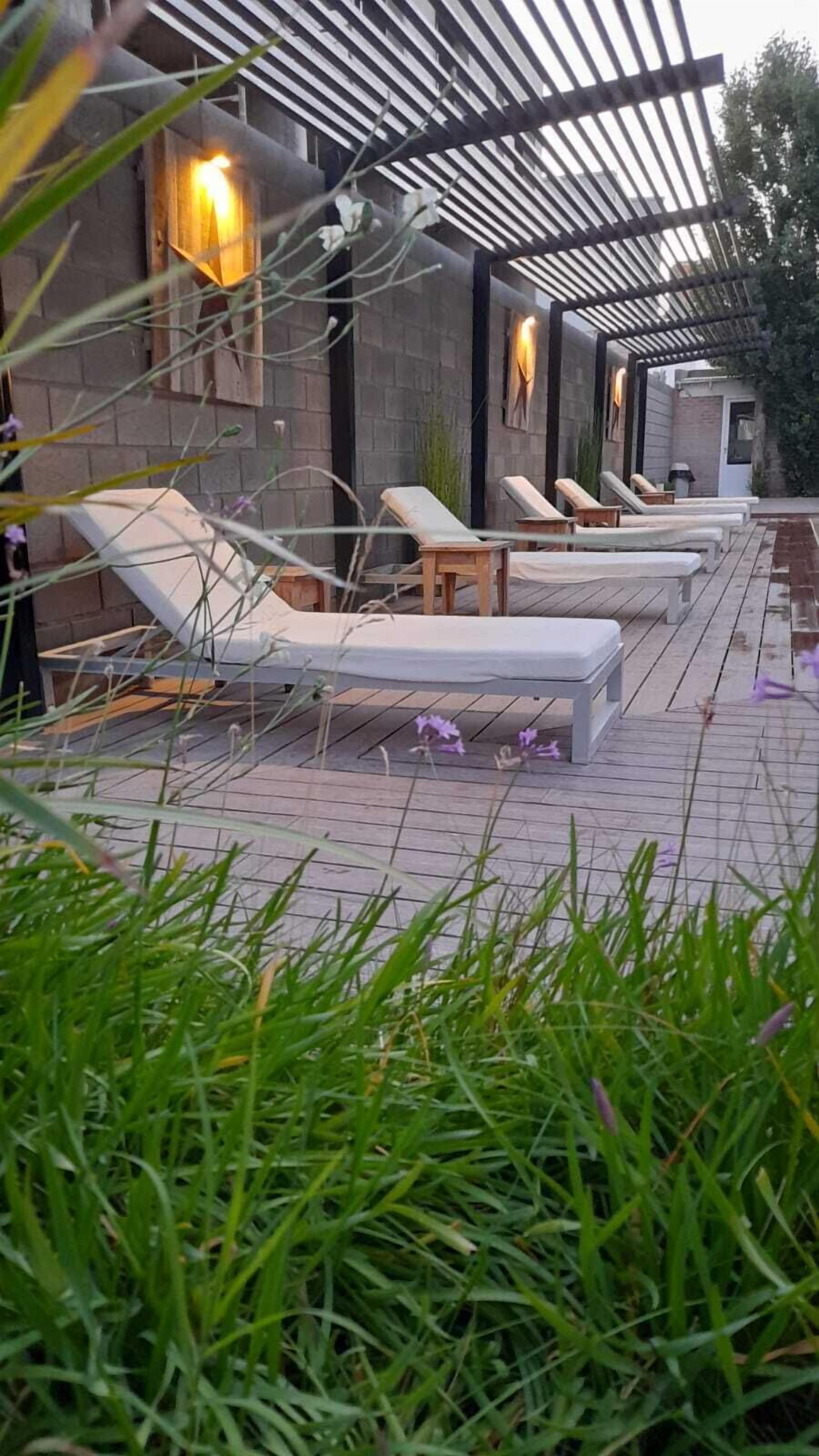 seasonal outdoor pool, pool loungers