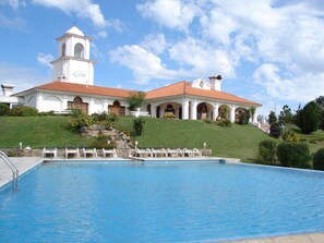 Indoor pool, outdoor pool, pool umbrellas