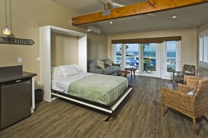 42-inch flat-screen TV with cable channels, TV, iPod dock - Beach Street Inn and Suites (Santa Cruz)