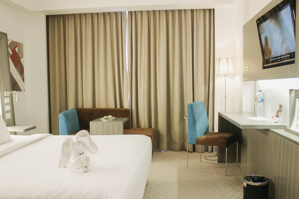 Habitación superior, 1 cama King size | Ropa de cama de alta calidad y minibar 