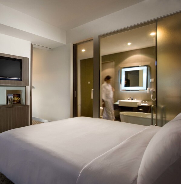 Suite, 1 cama King size | Ropa de cama de alta calidad y minibar 