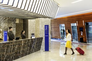 Check-in/check-out kiosk