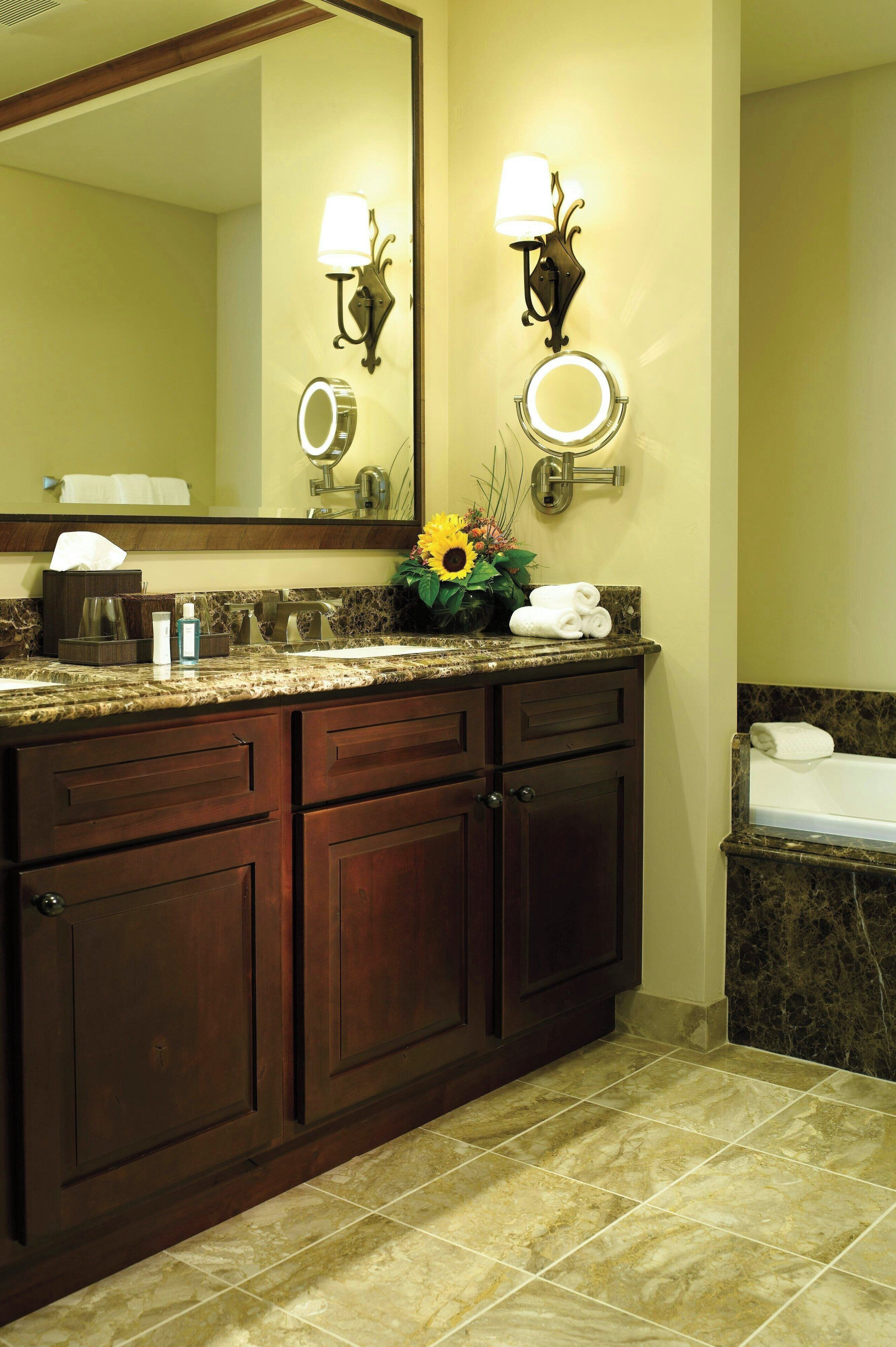 bathtub, deep-soaking bathtub, hair dryer, towels