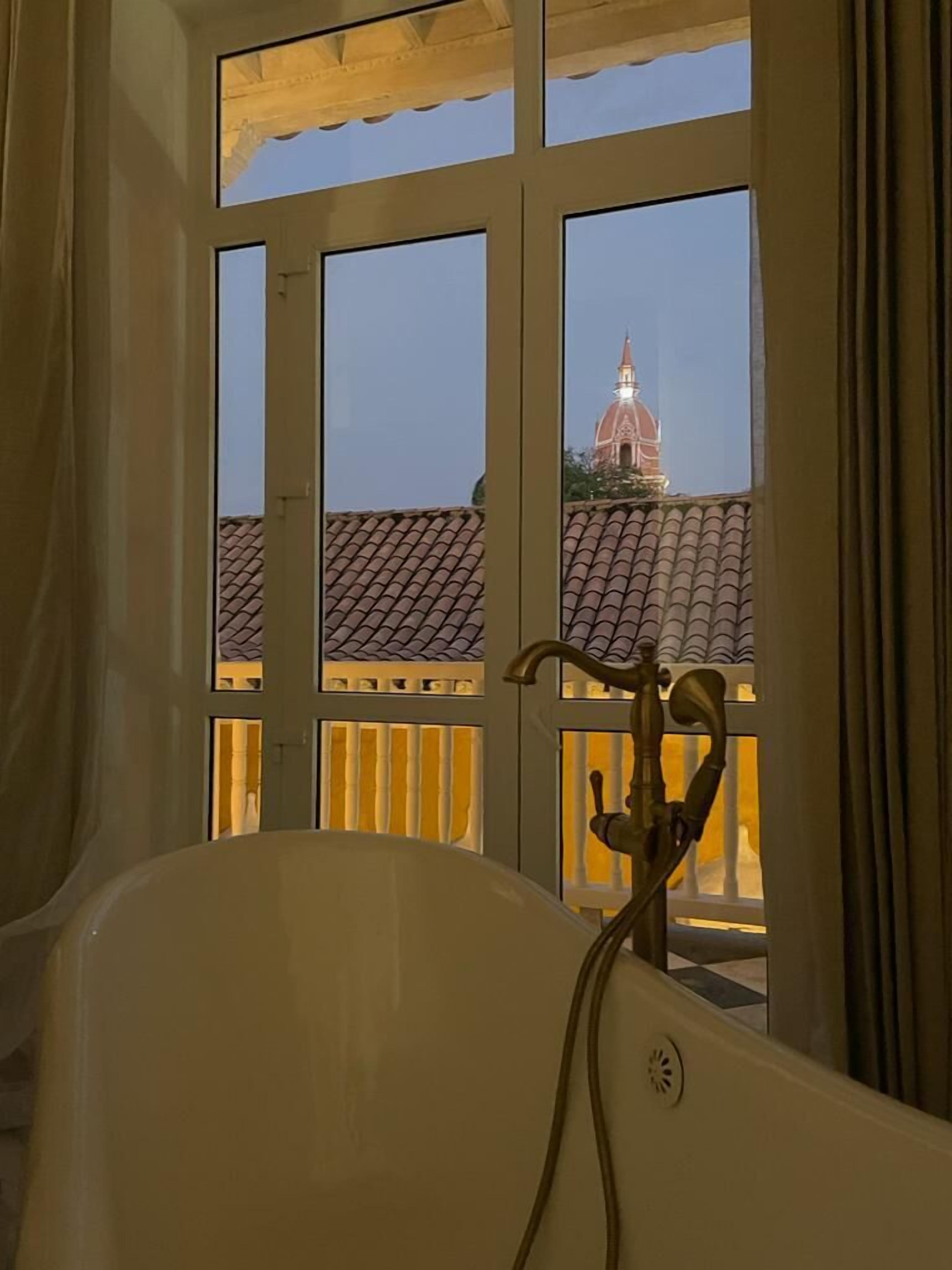 grand suite | bathroom | shower, free toiletries, hair dryer, bathrobes