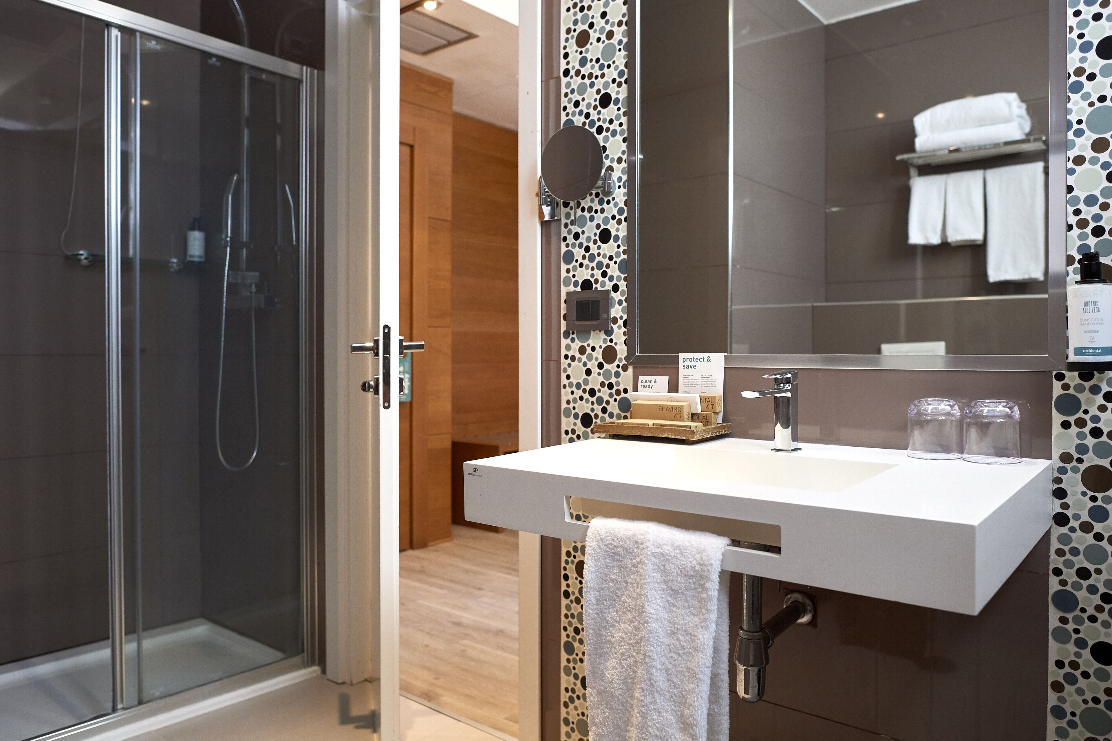 shower, rainfall showerhead, eco-friendly toiletries, hair dryer