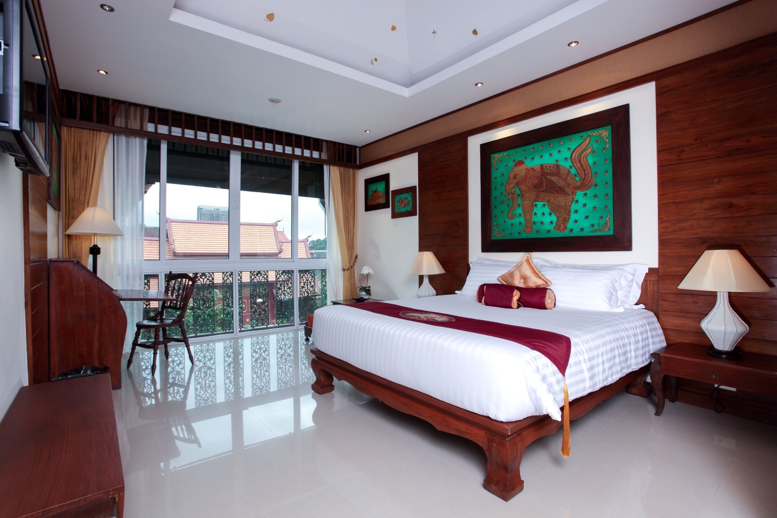 deluxe double room | 1 bedroom, minibar, in-room safe, individually decorated