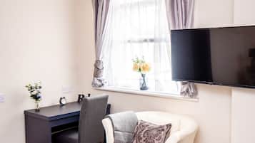 Individually furnished, desk, laptop workspace, blackout drapes