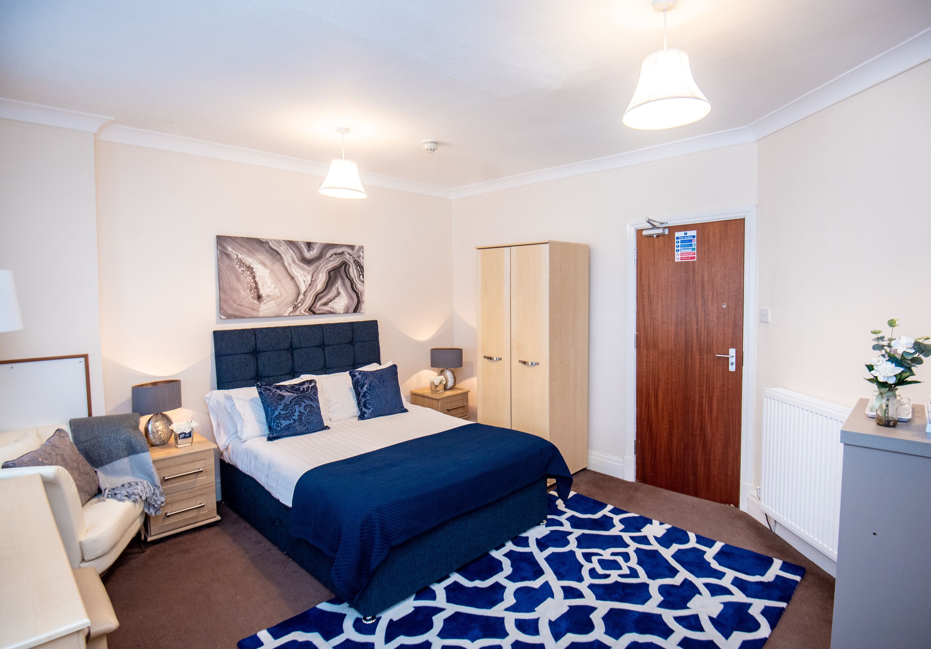 Family Quadruple Room | Individually furnished, desk, laptop workspace, blackout drapes