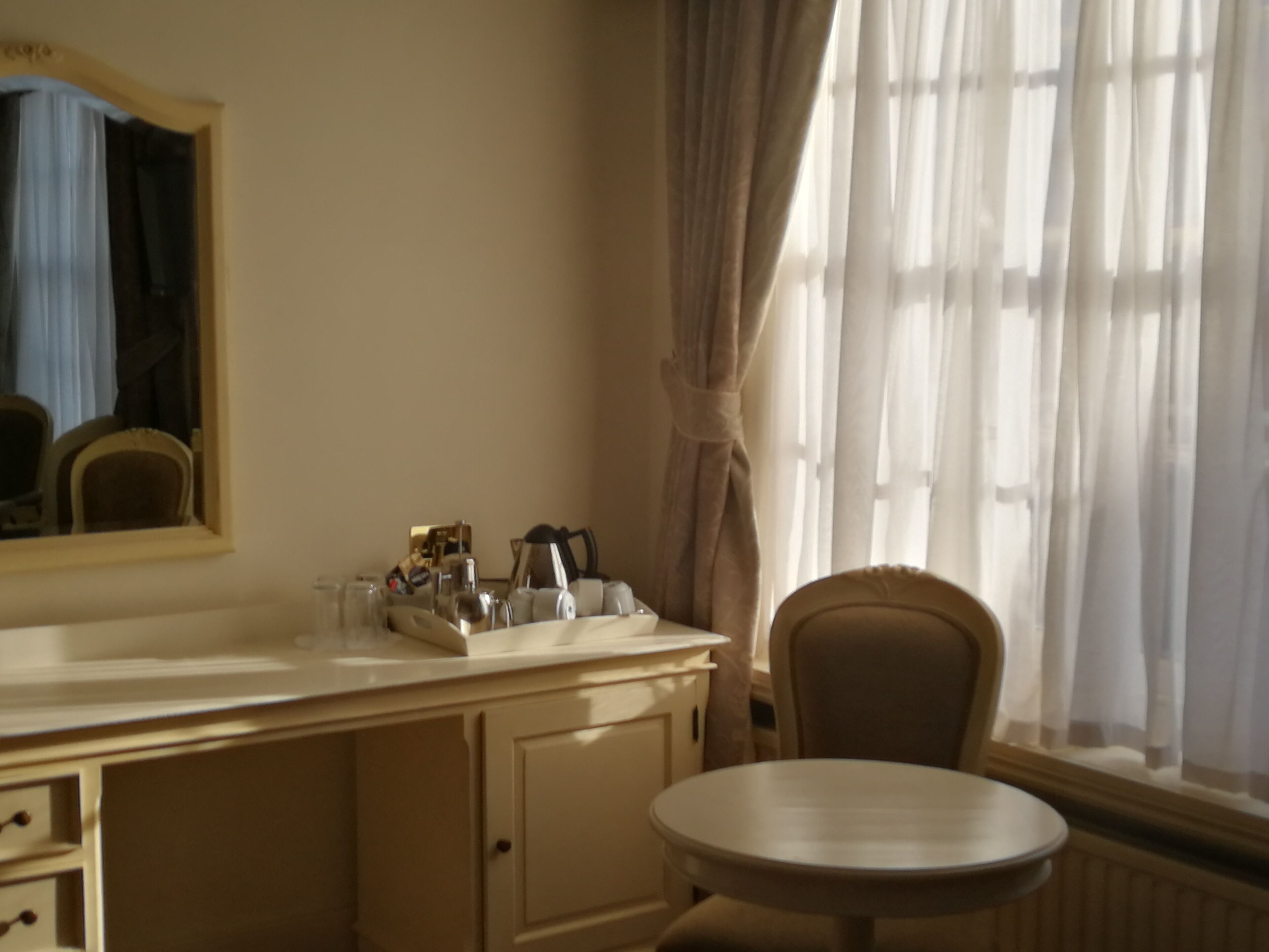 premium bedding, desk, laptop workspace, blackout curtains