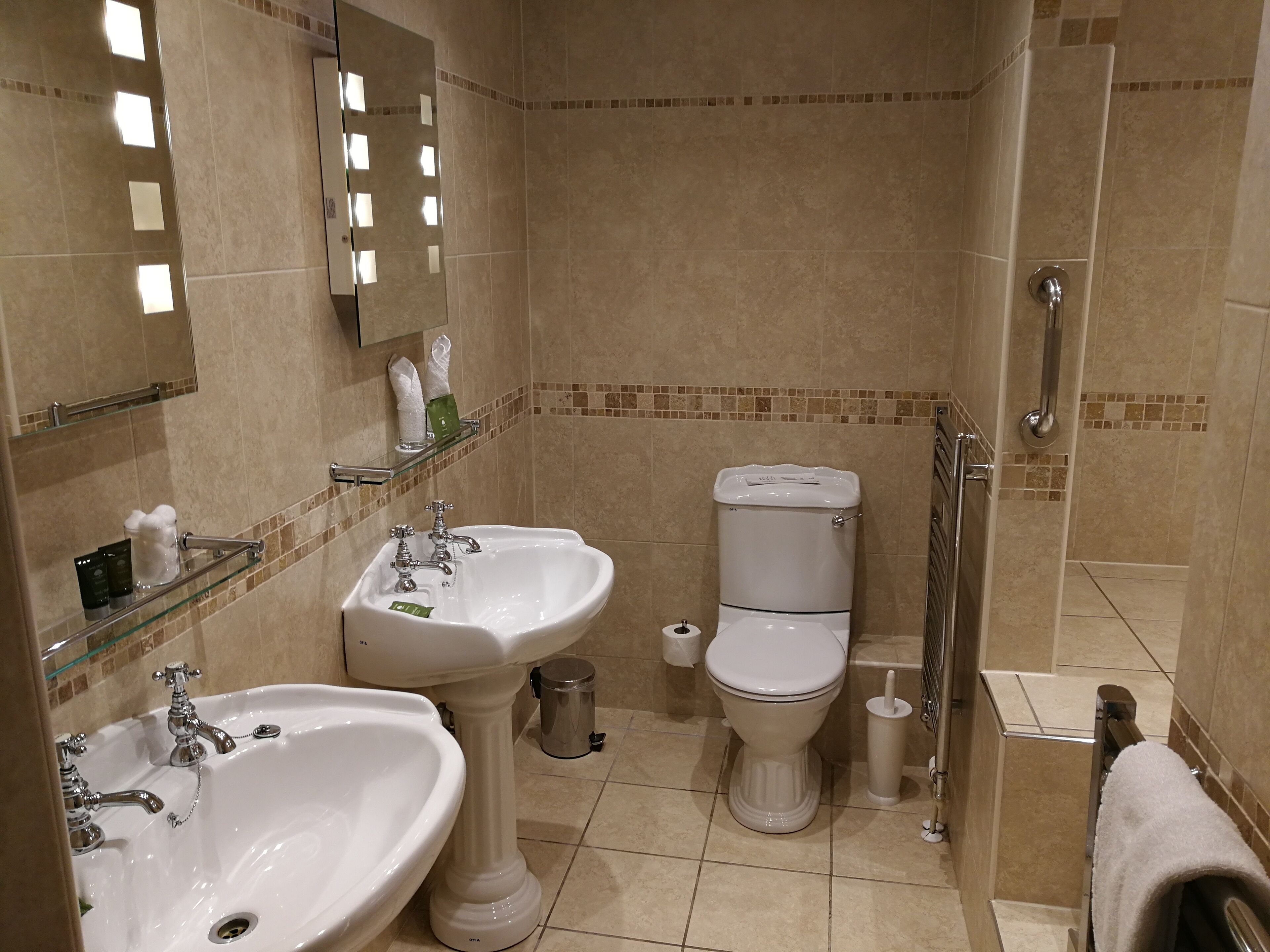 free toiletries, hair dryer, slippers, towels