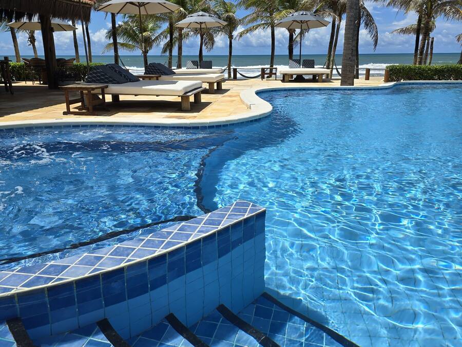Outdoor pool, open 8 AM to 8 PM, pool umbrellas, pool loungers