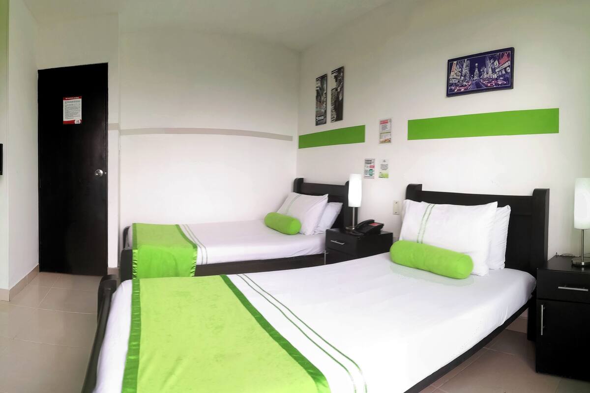 Twin Room | Premium bedding, down comforters, blackout drapes