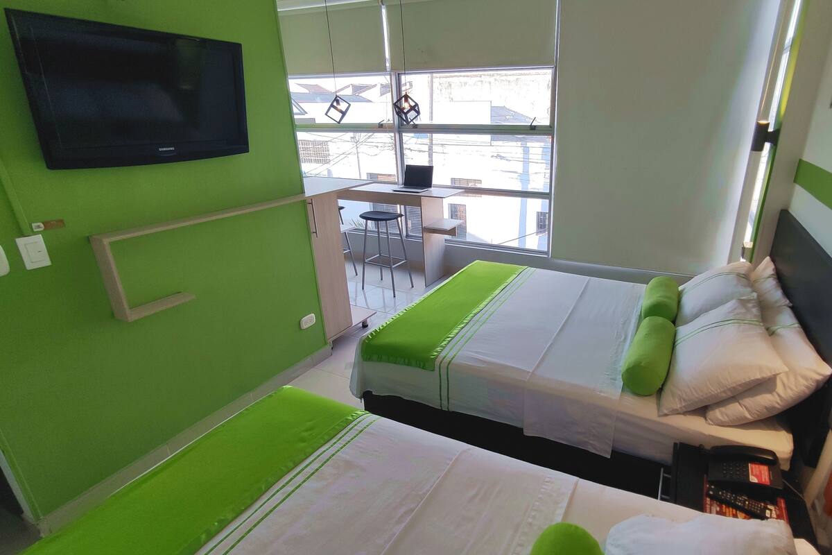 Superior Triple Room, Kitchen, City View | Premium bedding, down comforters, blackout drapes