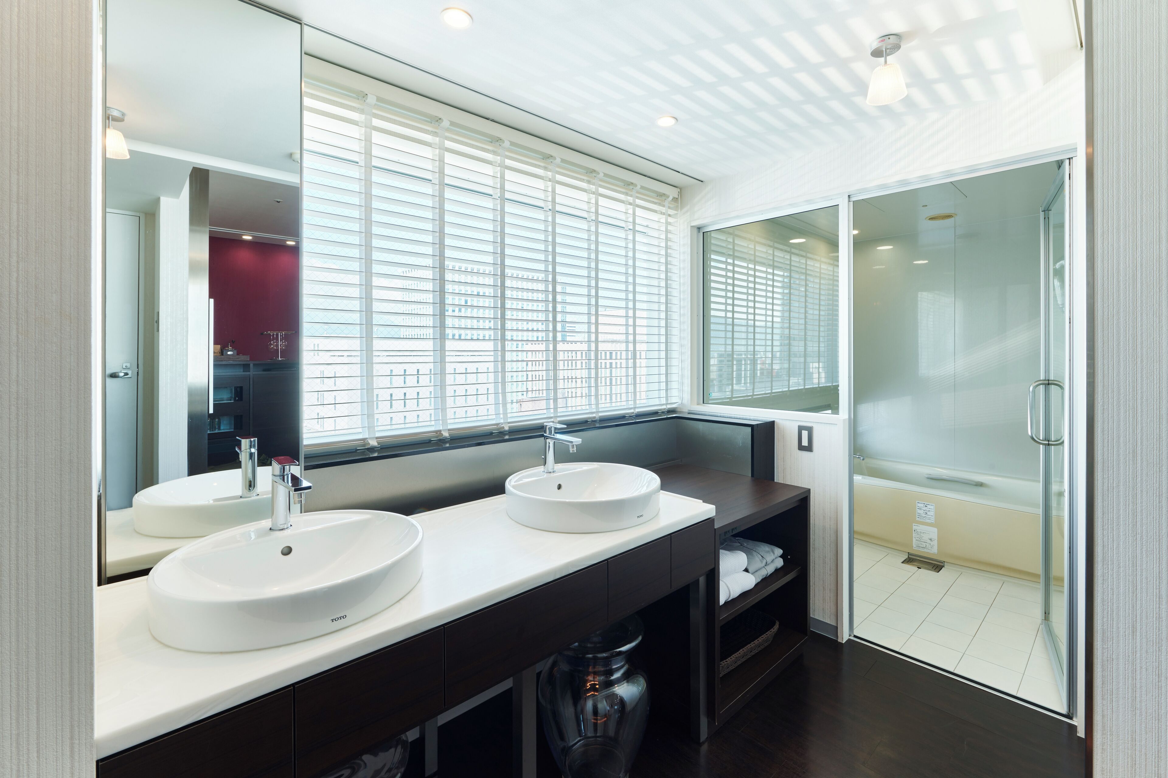 hair dryer, slippers, bidet, towels