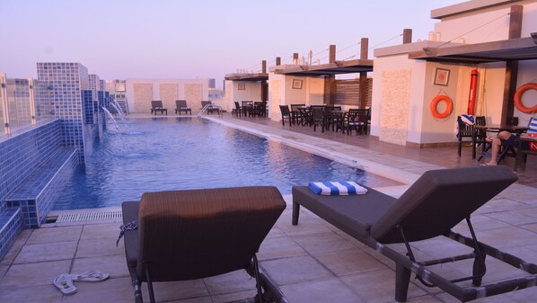 Outdoor pool, pool loungers