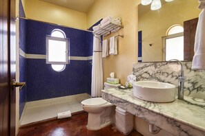 Shower, free toiletries, hair dryer, towels