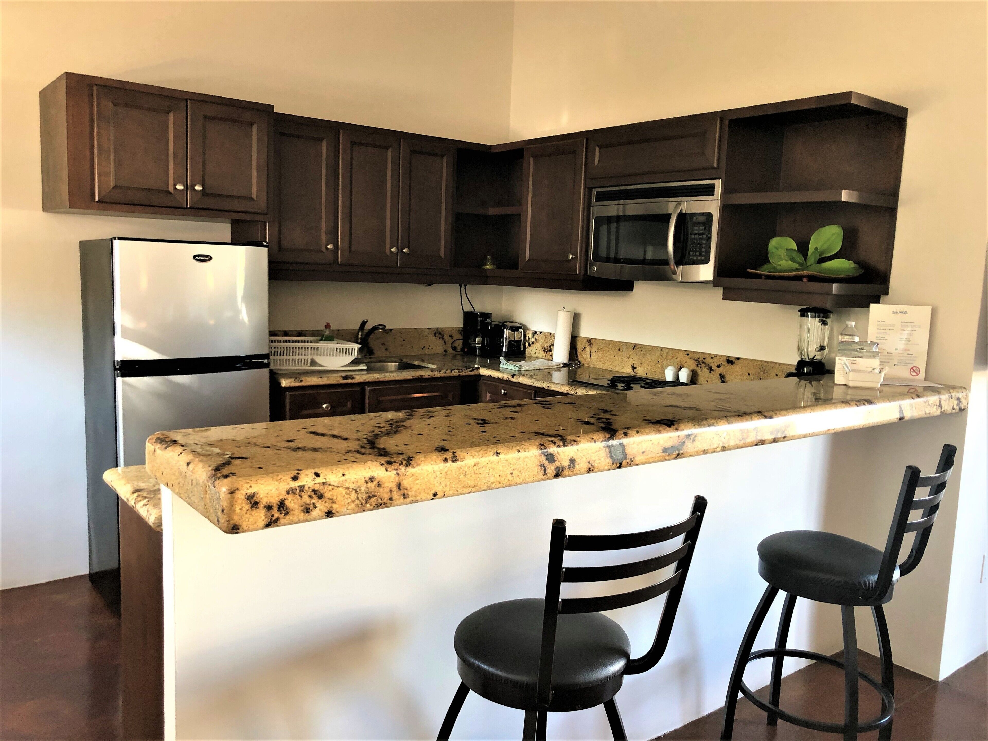 classic twin room | private kitchen | full-sized fridge, microwave, stovetop, coffee/tea maker