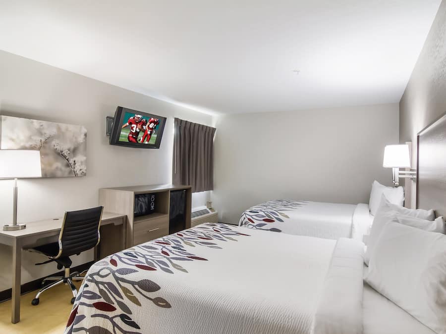 Desk, laptop workspace, blackout curtains, iron/ironing board